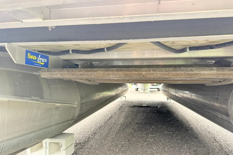 Slide: The Image of Underneath view of a 2013 South Bay 522CR pontoon boat with Sea-Legs system. - 9