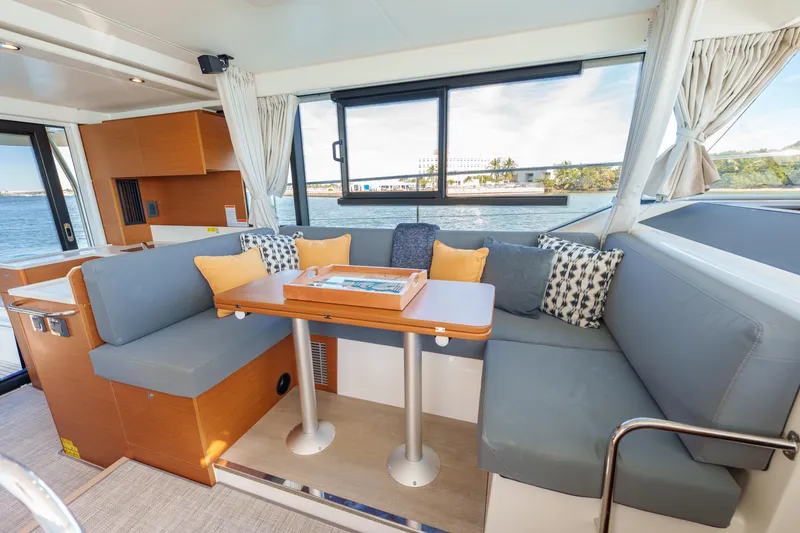 Slide: The Image of Interior of 2025 Beneteau Swift Trawler 41 Fly with cozy seating and ocean view. - 27