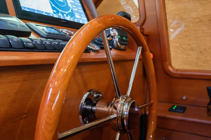 Slide: The Image of Steering wheel and dashboard of 2018 Palm Beach Motor Yachts 55. - 22