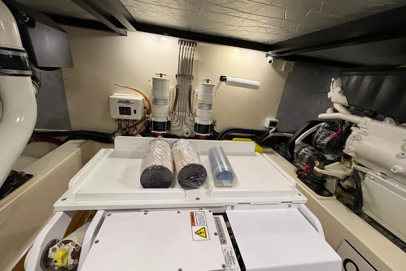 Slide: The Image of Engine room of 2018 Palm Beach Motor Yachts 55, showcasing equipment and components. - 40