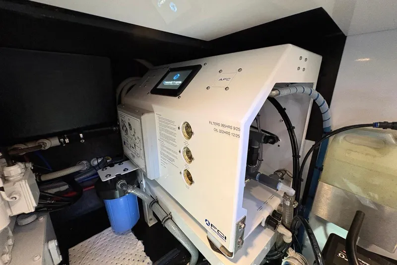 Slide: The Image of Engine room of 2018 Palm Beach Motor Yachts 55, showcasing advanced machinery and components. - 48
