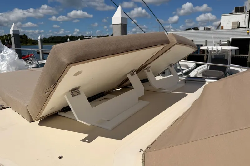 Slide: The Image of 2018 Palm Beach Motor Yachts 55 with adjustable sunbed on deck. - 17