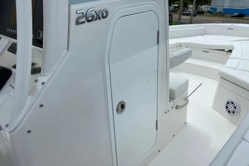 Slide: The Image of 2027 Regulator 26XO boat interior with seating and storage compartments. - 43