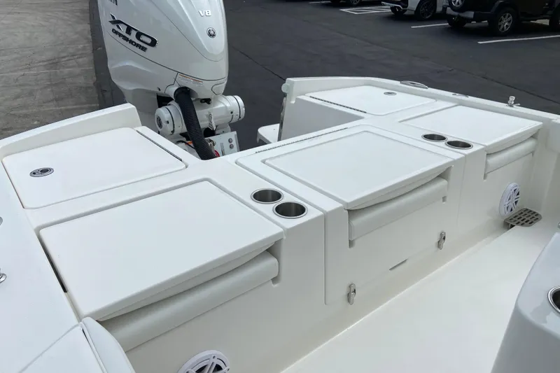 Slide: The Image of 2027 Regulator 26XO boat with Yamaha V8 engine, featuring spacious deck and storage compartments. - 5