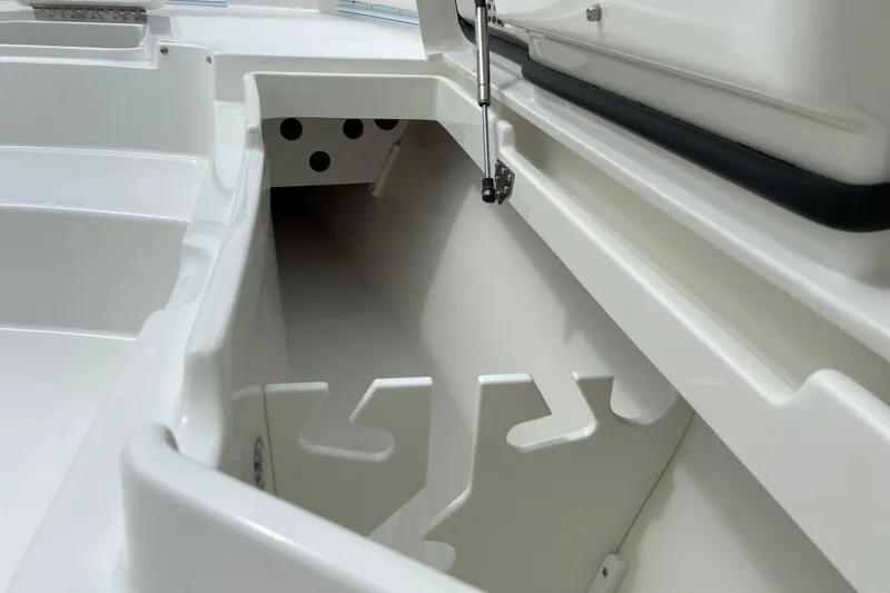 Slide: The Image of Interior storage compartment of 2027 Regulator 26XO boat, showcasing sleek design and functionality. - 54