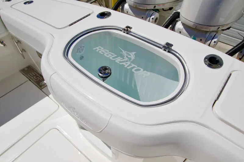 Slide: The Image of 2027 Regulator 35 boat livewell with logo, showcasing sleek design and functionality. - 11