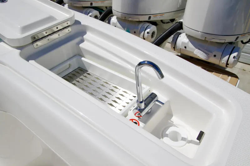 Slide: The Image of Luxury boat sink on 2027 Regulator 35 model, featuring sleek chrome faucet. - 12