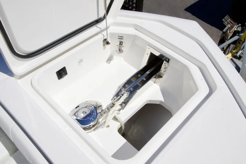 Slide: The Image of Anchor compartment of 2027 Regulator 35 boat, featuring a modern winch system. - 27