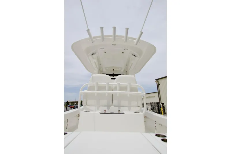 Slide: The Image of 2026 Regulator 26XO boat interior with seating and rod holders. - 21