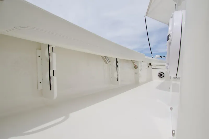 Slide: The Image of 2026 Regulator 26XO boat interior, showcasing sleek white design and modern features. - 25