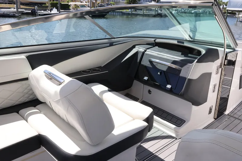 Slide: The Image of Luxurious interior of 2022 Regal 33 OBX boat with plush seating and sleek design. - 35