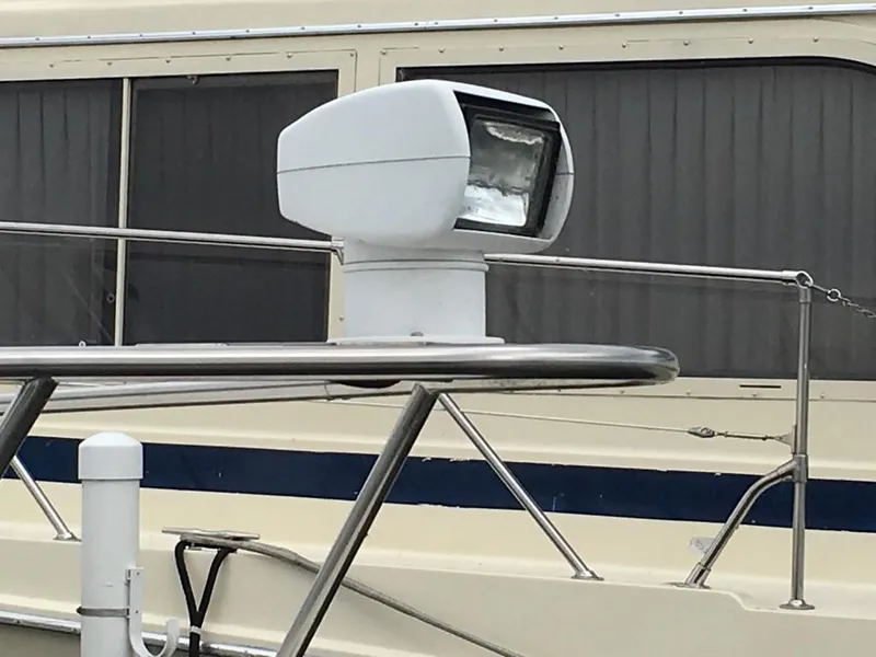 Slide: The Image of Spotlight on a 2004 Cruisers Yachts 3372 Express boat. - 13