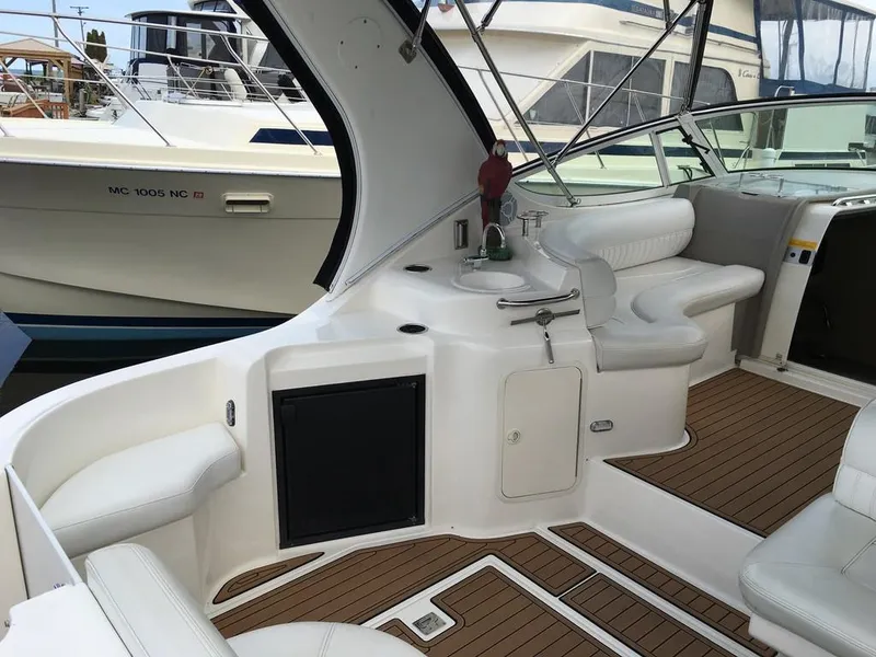 Slide: The Image of Interior of a 2004 Cruisers Yachts 3372 Express with elegant features. - 16