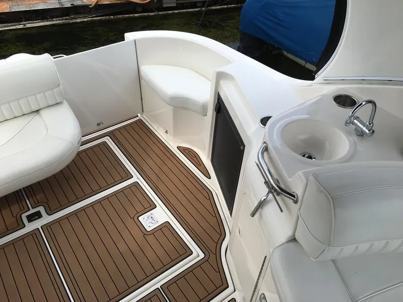 Slide: The Image of Interior of a 2004 Cruisers Yachts 3372 Express with wood-look flooring. - 17