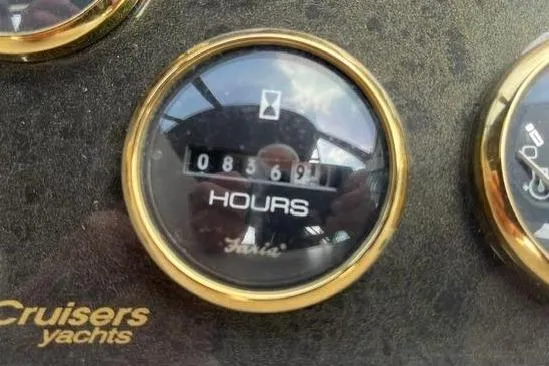 Slide: The Image of Hour meter of 2004 Cruisers Yachts 3372 Express showing 8369 hours. - 31