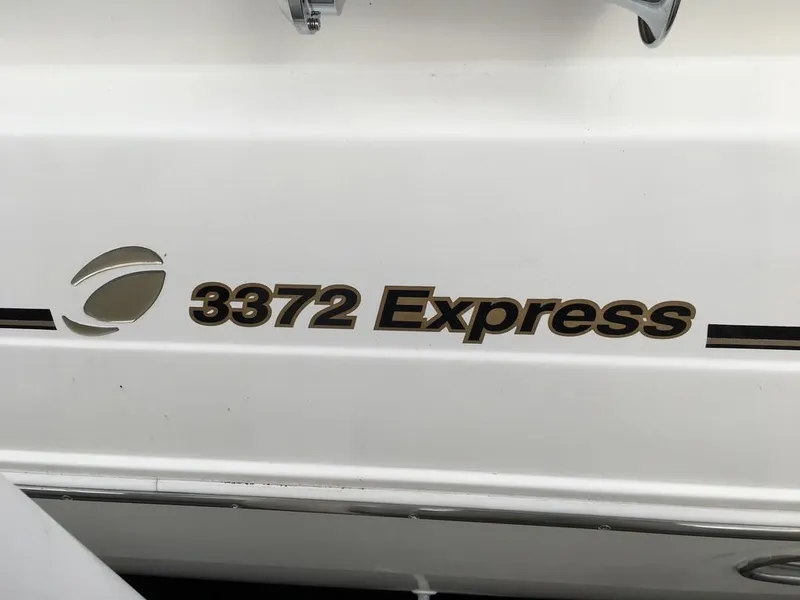 Slide: The Image of Cruisers Yachts 3372 Express boat, 2004 model, hull lettering. - 5