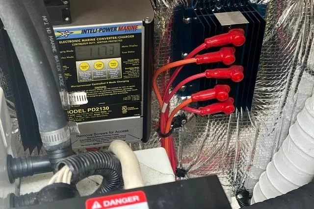 Slide: The Image of Engine compartment of a 2004 Cruisers Yachts 3372 Express with electronic marine converter. - 67