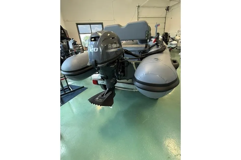 Slide: The Image of Inflatable boat with Yamaha 20HP motor, Desner CL310 FCT, 2026 model, in showroom. - 10