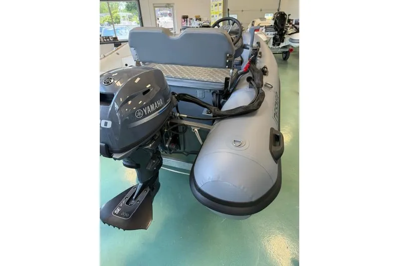 Slide: The Image of Inflatable boat with Yamaha motor, Desner CL310 FCT, 2026 model, in showroom. - 3