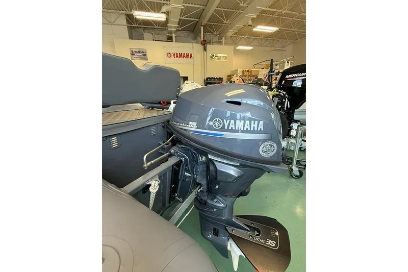 Slide: The Image of Boat motor showroom featuring Yamaha outboard engine, Desner CL310 FCT, 2026 model. - 9