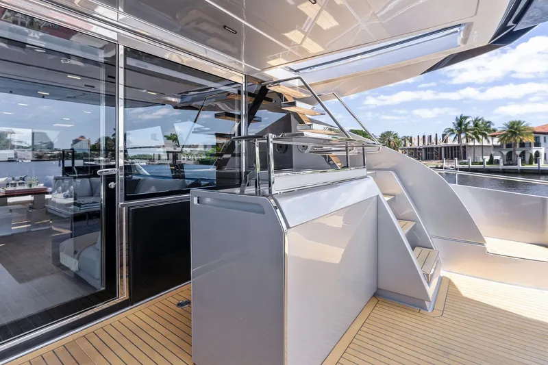 Slide: The Image of Luxury yacht Riva 88' Folgore 2022 with modern design and elegant features. - 11