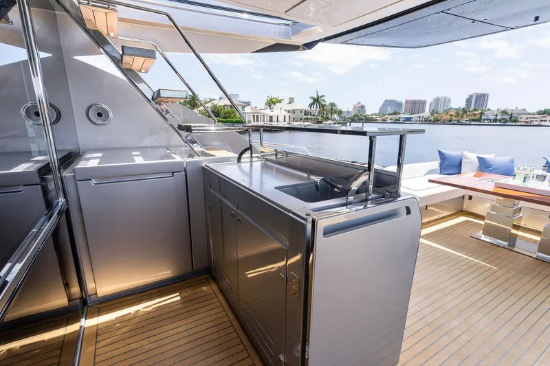 Slide: The Image of Luxurious Riva 88' Folgore yacht with modern outdoor kitchen, 2022 model. - 12