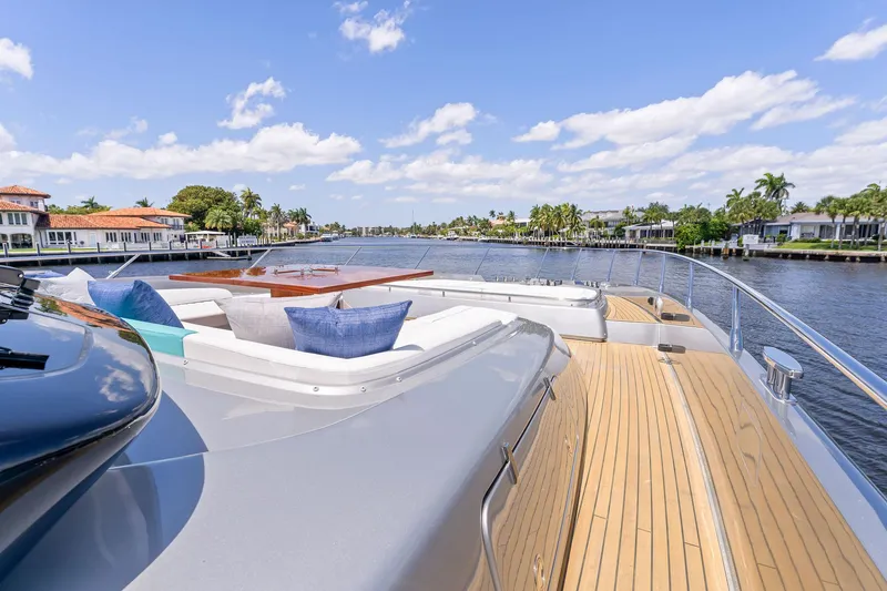 Slide: The Image of Luxury yacht Riva 88' Folgore 2022 on calm waters. - 16