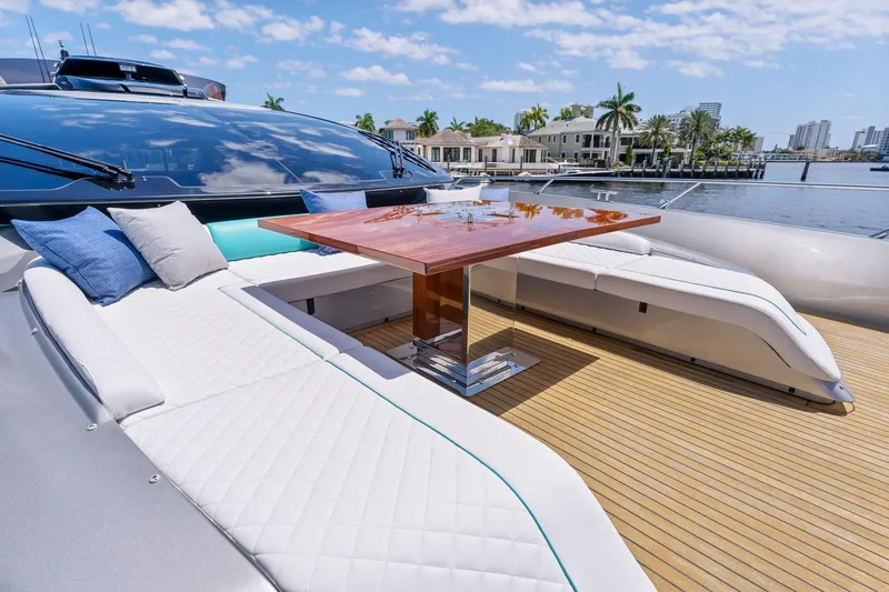 Slide: The Image of Luxury yacht Riva 88' Folgore 2022 with elegant outdoor seating area. - 17