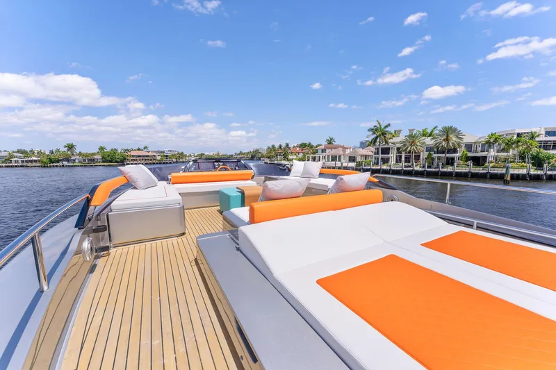 Slide: The Image of Luxury yacht Riva 88' Folgore 2022 on calm water with sun deck. - 22