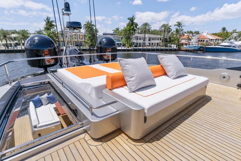 Slide: The Image of Luxury yacht Riva 88' Folgore 2022 with sun deck by the water. - 23