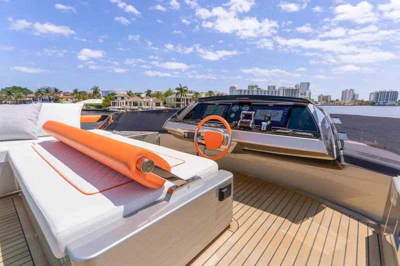 Slide: The Image of Luxury yacht Riva 88' Folgore 2022 with modern cockpit and sun deck. - 25