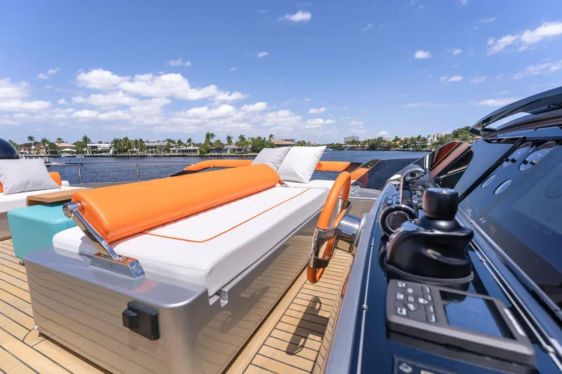 Slide: The Image of Luxury yacht Riva 88' Folgore 2022 with stylish deck and controls. - 26