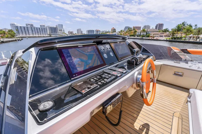 Slide: The Image of Riva 88' Folgore 2022 yacht cockpit with modern navigation. - 28