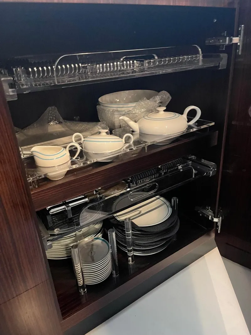 Slide: The Image of Elegant dinnerware in a Riva 88' Folgore cabinet, 2022 model. - 34