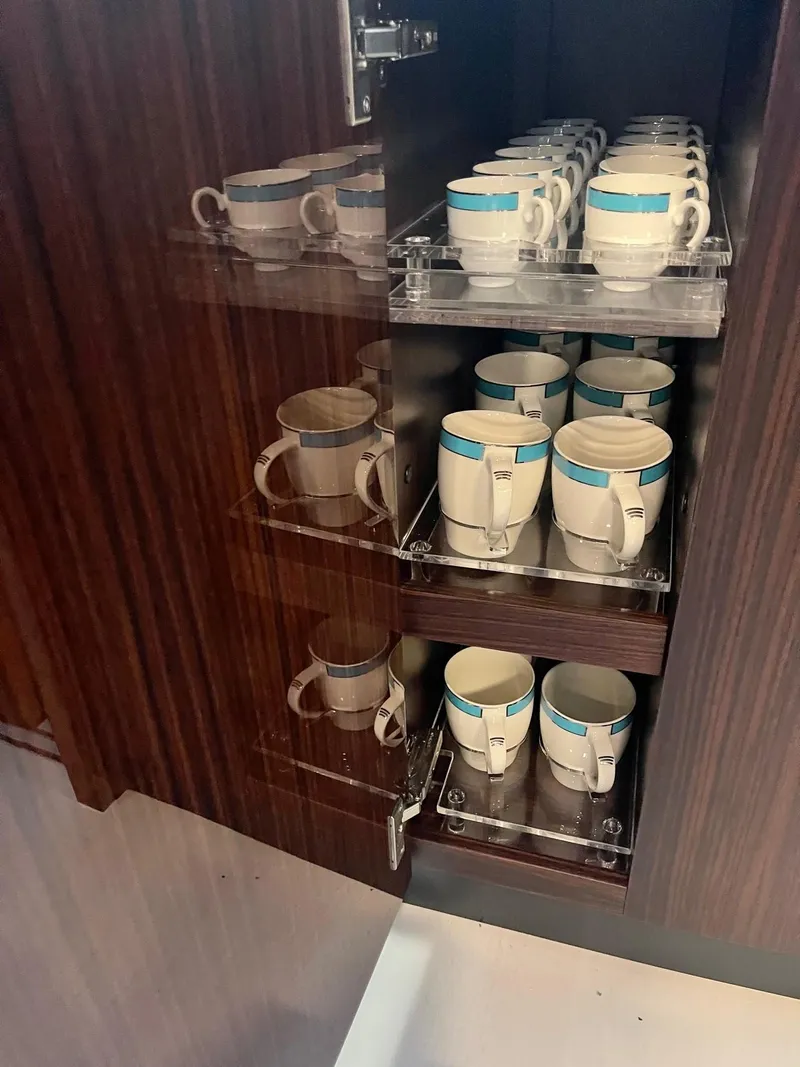 Slide: The Image of Cups in a cabinet on the Riva 88' Folgore yacht. - 36