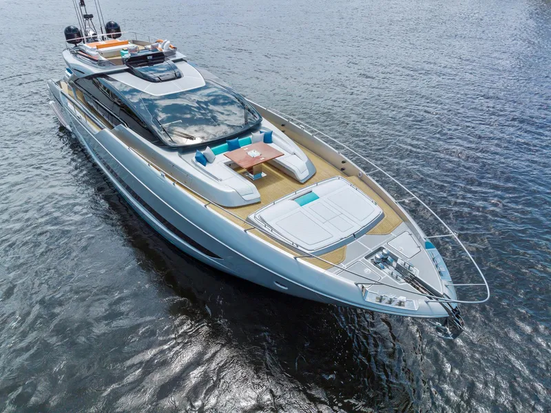 Slide: The Image of Luxury yacht Riva 88' Folgore 2022 on calm water. - 4