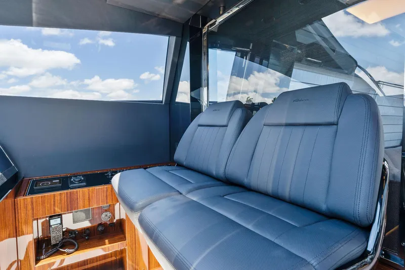 Slide: The Image of Interior of Riva 88' Folgore yacht, luxurious blue seating, 2022 model. - 45