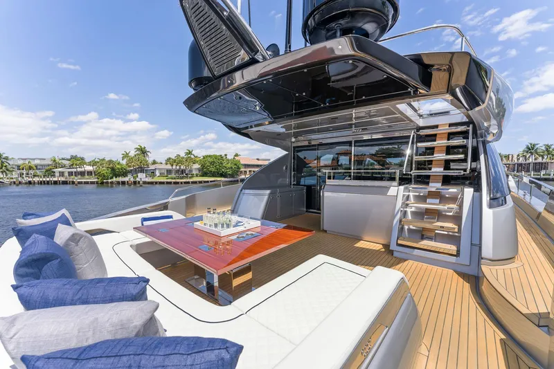 Slide: The Image of Luxury yacht Riva 88' Folgore 2022 with stylish deck and seating area. - 7