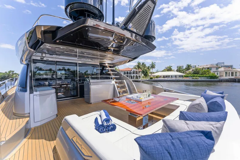 Slide: The Image of Luxury yacht Riva 88' Folgore 2022 on calm water. - 9