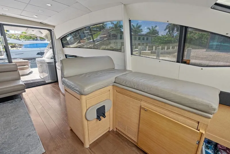 Slide: The Image of Luxurious interior of 2013 Pershing 64 yacht with sleek seating and modern design. - 22
