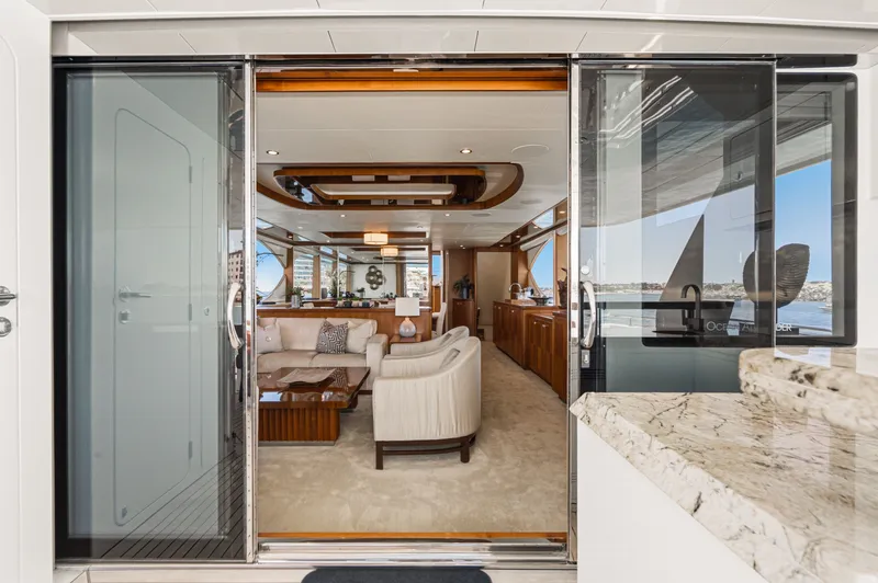 Slide: The Image of Interior view of a luxurious yacht with elegant furnishings and large windows. - 30