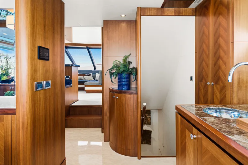 Slide: The Image of Interior of a luxury yacht with wooden furnishings and marble details. - 44