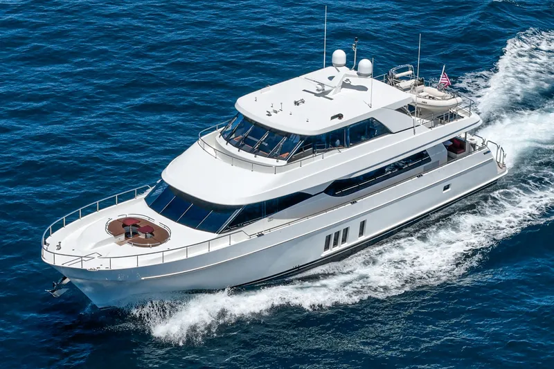 Slide: The Image of 2015 Ocean Alexander 90 Skylounge Motoryacht cruising on open water. - 5