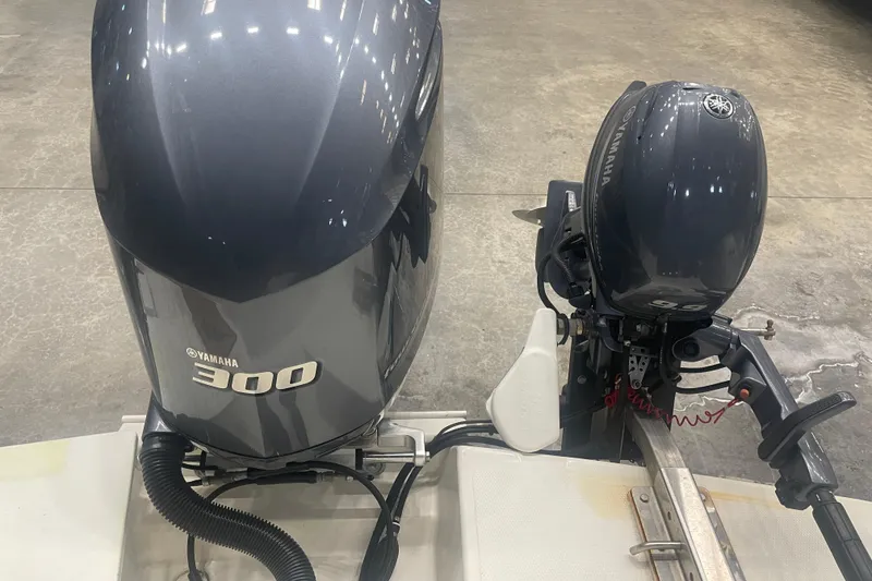 Slide: The Image of Yamaha 300 and 9.9 outboard motors on 2017 Cutwater C-24 Coupe boat. - 4