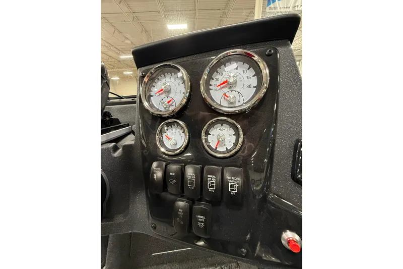 Slide: The Image of Dashboard of 2026 Tracker Targa V-19 WT boat with gauges and switches. - 13