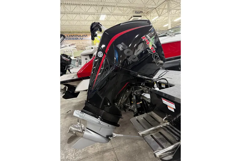 Slide: The Image of 2026 Tracker Targa V-19 WT boat with powerful Mercury Pro XS outboard motor. - 22