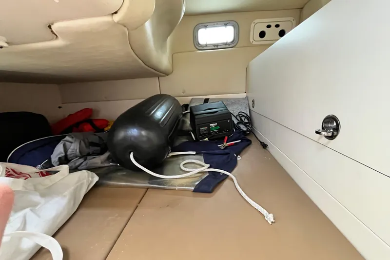 Slide: The Image of Interior cabin of 2006 Boston Whaler 285 Conquest with storage items and equipment. - 40