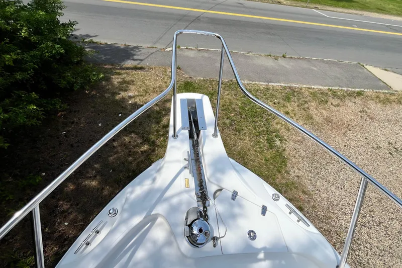 Slide: The Image of Bow view of 2006 Boston Whaler 285 Conquest, featuring anchor and railings. - 43