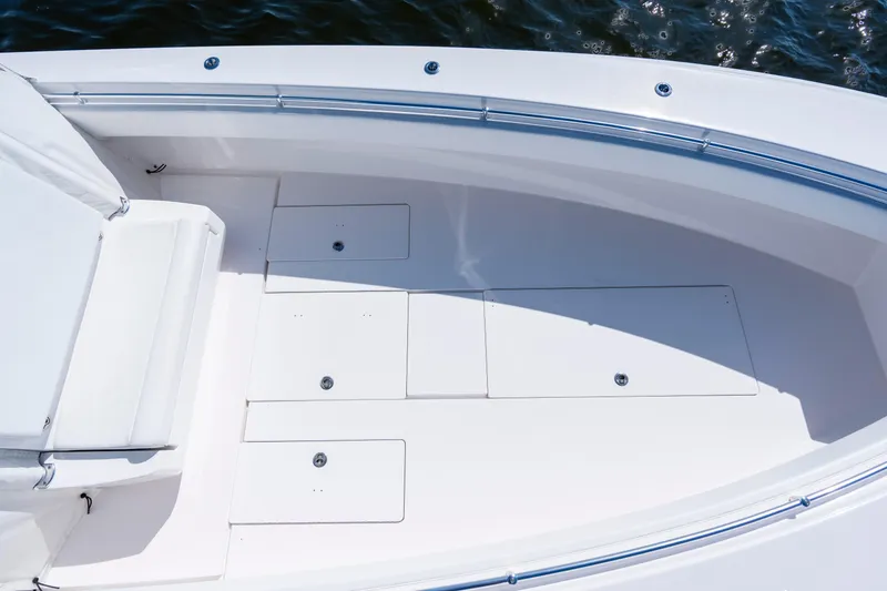 Slide: The Image of 2015 Contender 39 ST boat deck with storage compartments and seating. - 20