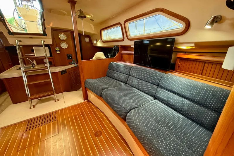 Slide: The Image of Luxurious interior of 2006 Island Packet 485 yacht with cozy seating and modern amenities. - 20